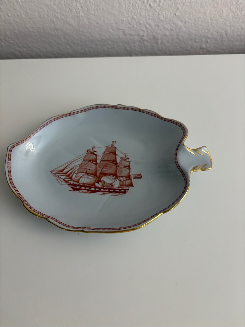Spode White Porcelain Leaf Dish with Red Ship and Gold Rim